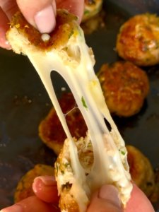 Chicken meatballs stuffed with mozzarella and honey-lemon glaze