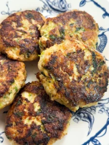 Chicken burgers with zucchini, kefalotyri, and lemon zest