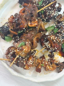 Mushroom skewers with teriyaki sauce