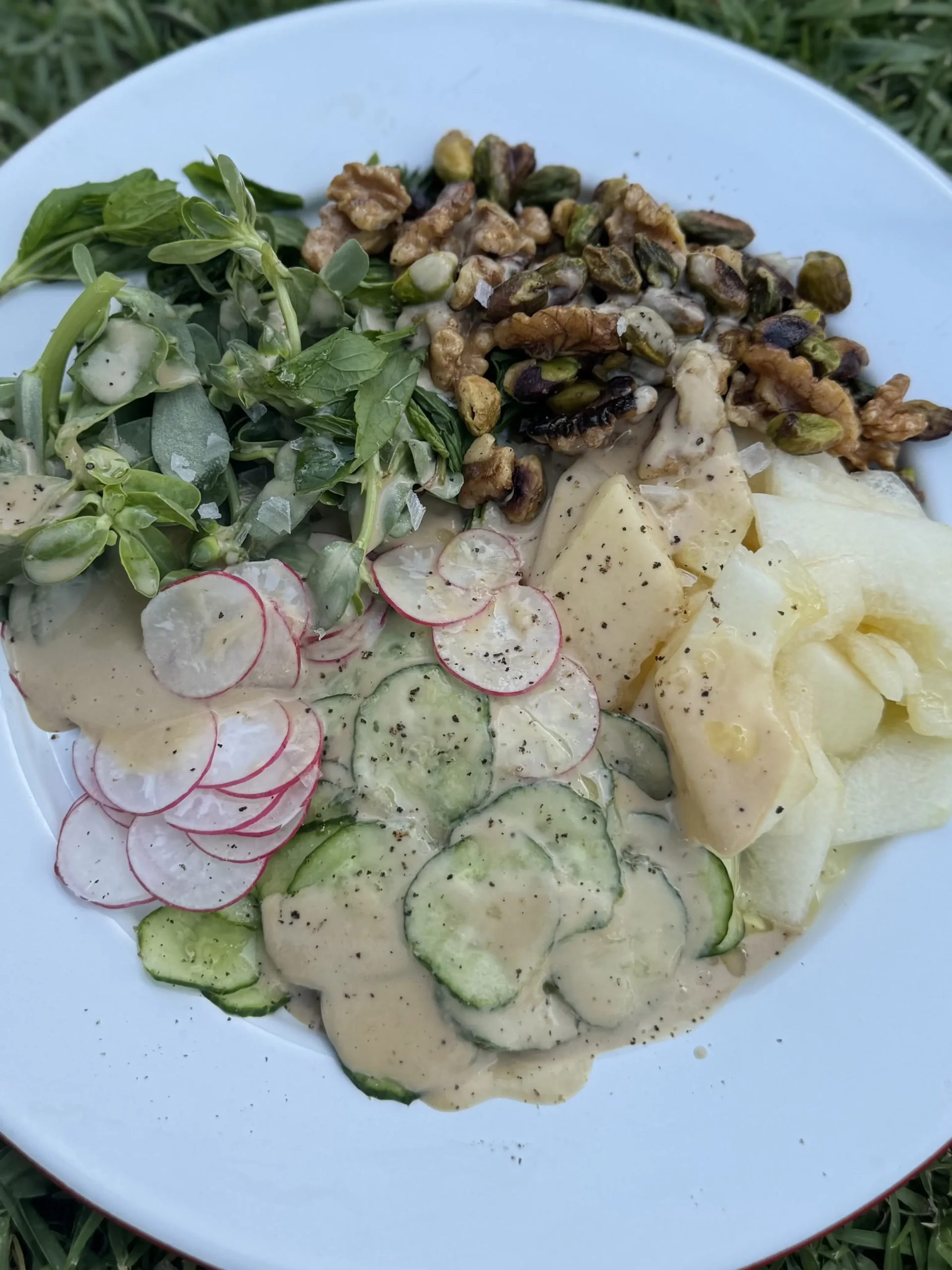 Summer salad with melon, nuts & herbs