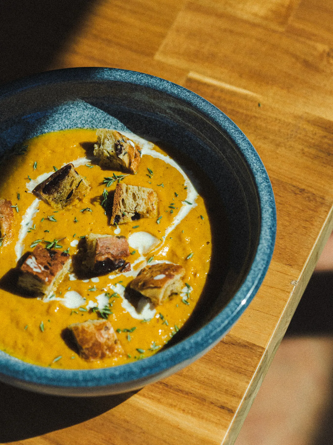 Roasted pumpkin velouté with olive pie croutons