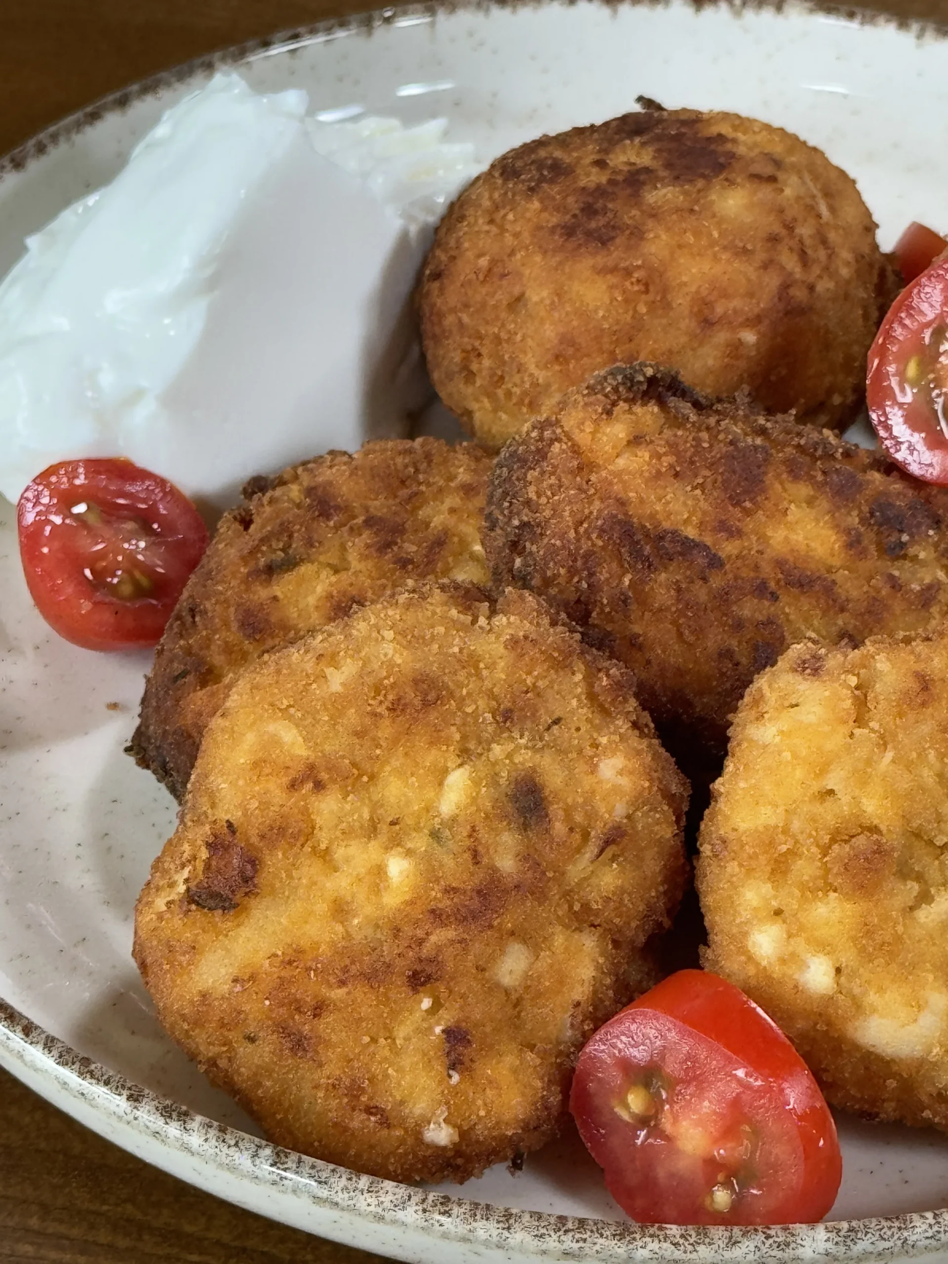 Crispy chicken bites with roasted potato leftovers