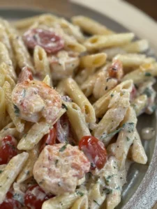 Penne with shrimp, vodka & cherry tomatoes
