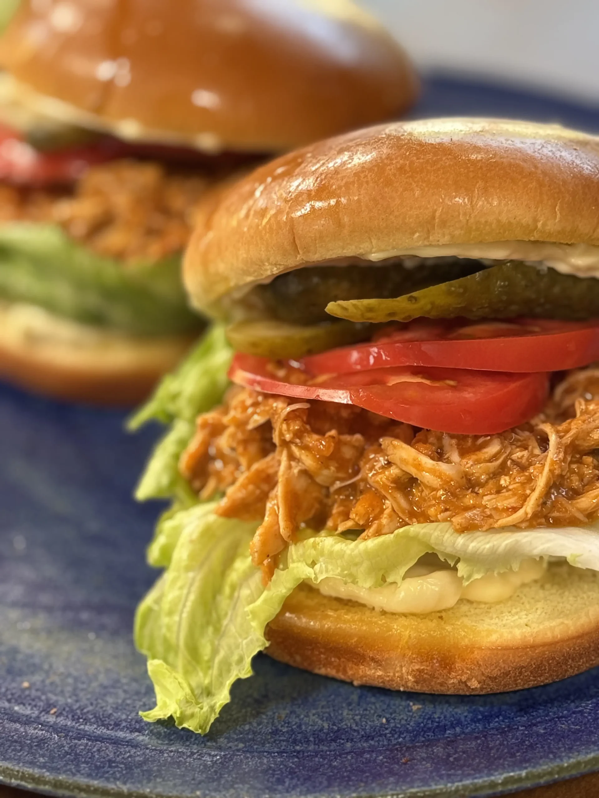 Pulled chicken sandwich with apple BBQ sauce