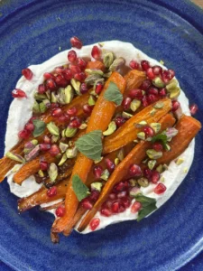 Roasted carrots with ricotta cream and pomegranate
