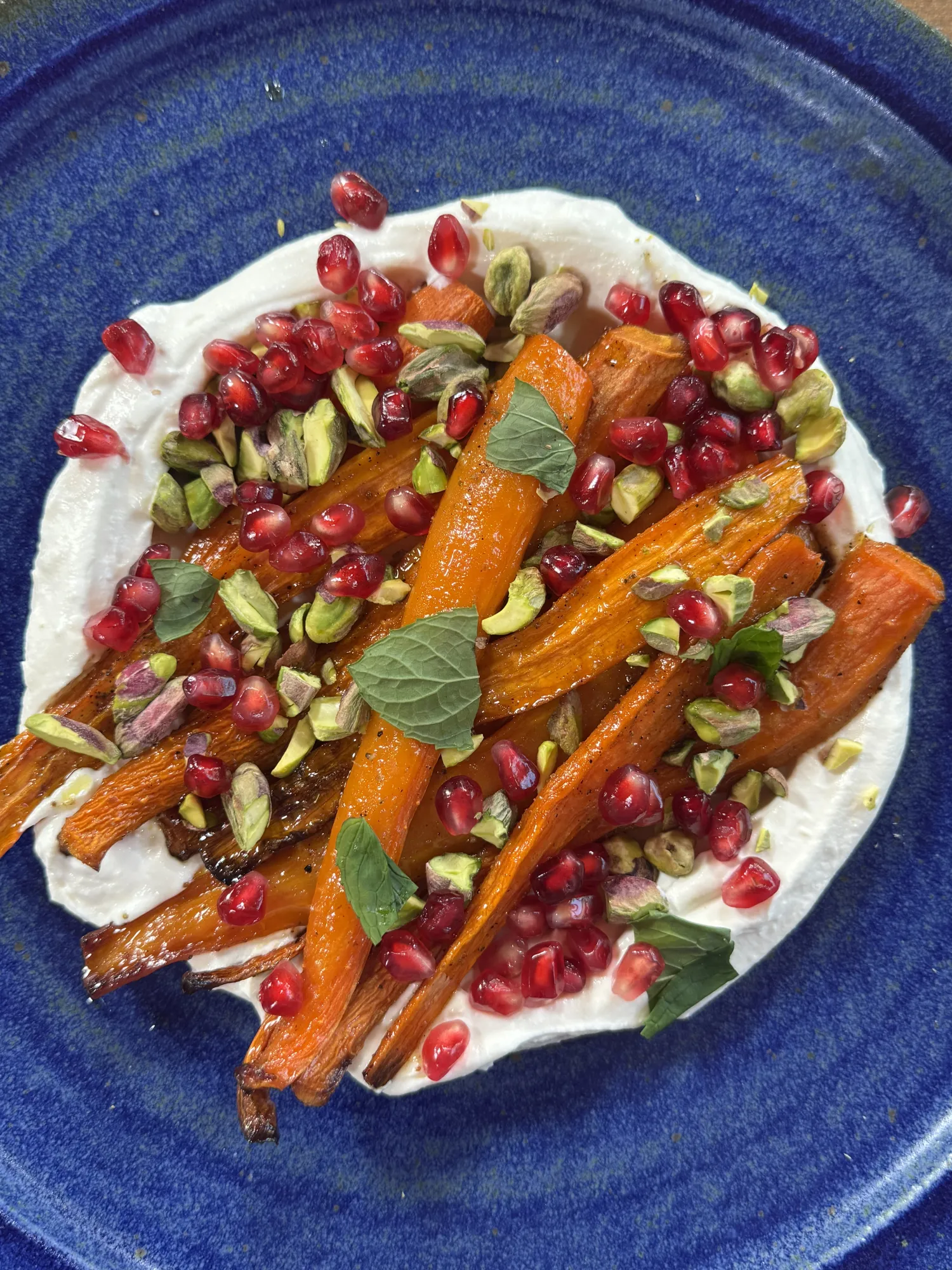 Roasted carrots with ricotta cream and pomegranate