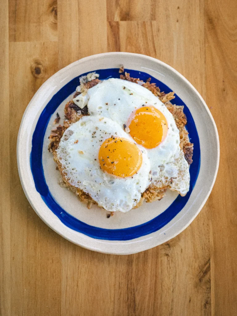 Crispy grated kolokasi with fried eggs
