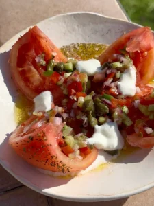 Stuffed tomato with Greek salad