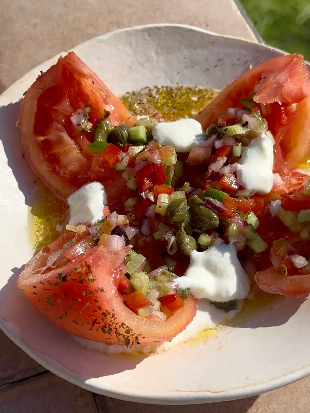 Stuffed tomato with Greek salad
